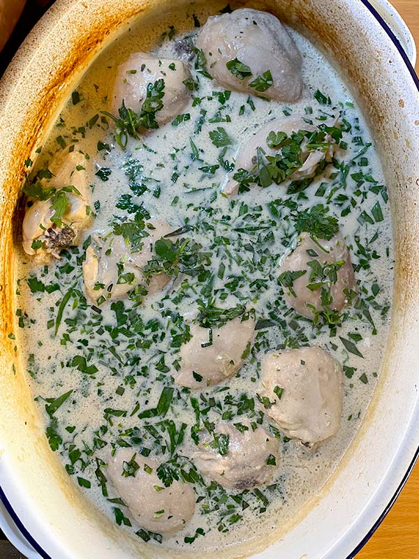 Mustard and herb poached chicken out of the oven