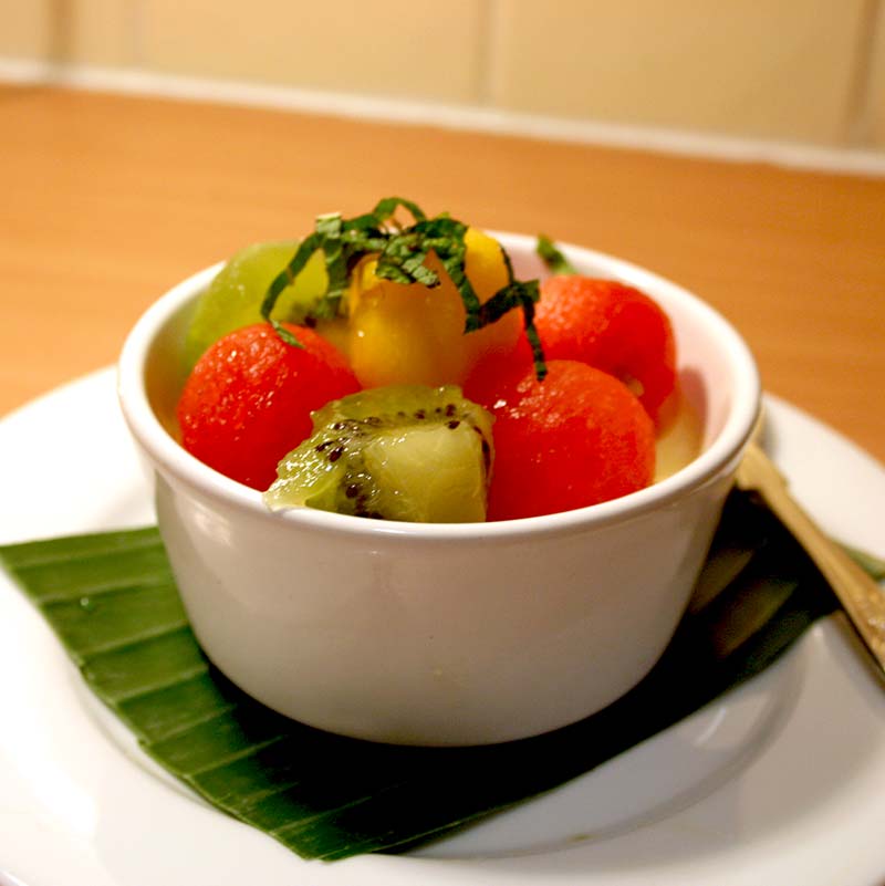 Coconut bavarois with tropical fruit salad serving