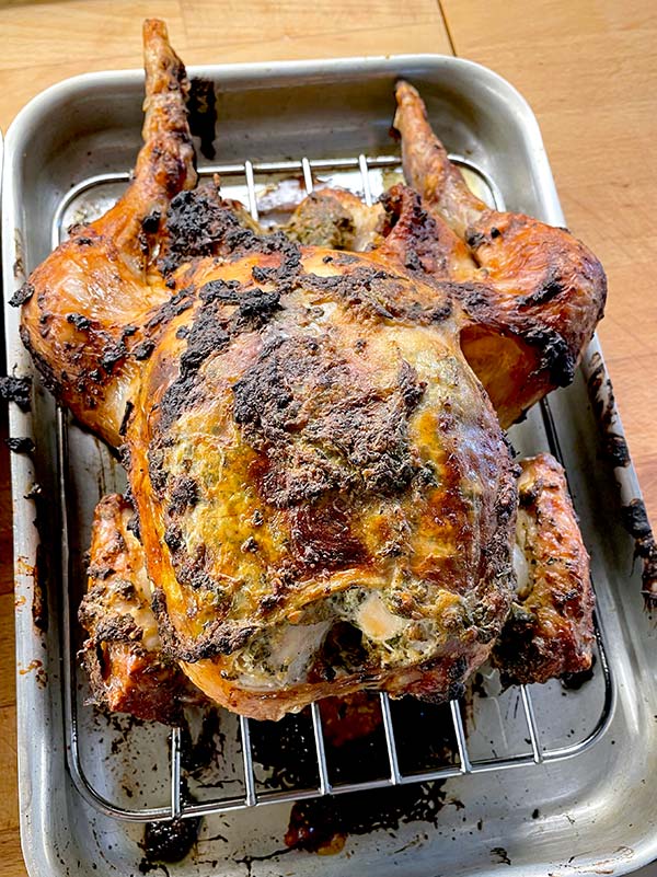 Mustard and parsley marinated roast chicken cooked