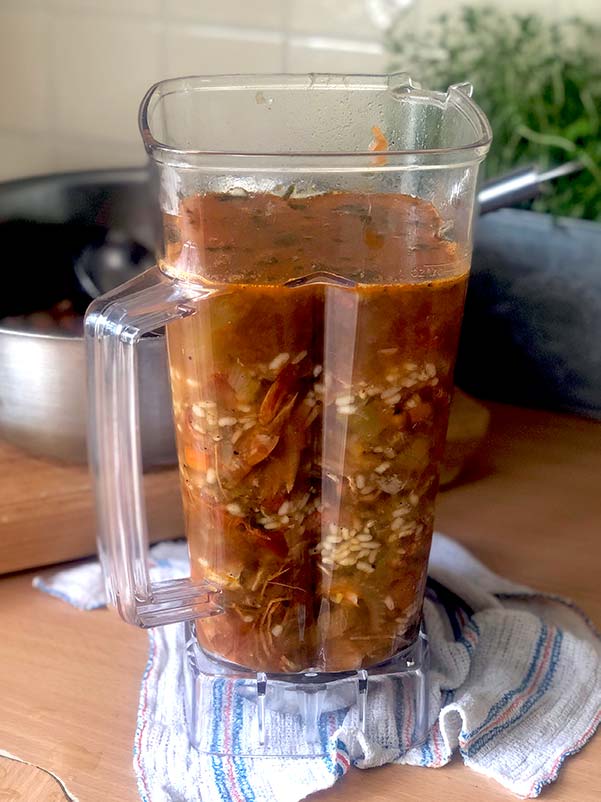 Prawn shells and vegetable broth in the blender