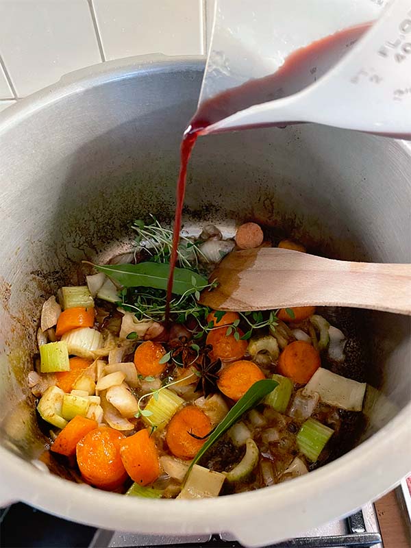 Making the stock with red wine
