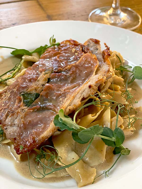 Pork saltimbocca with pappardelle and madeira sauce served