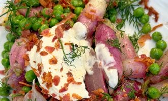 Butter glazed radish with peas and dill