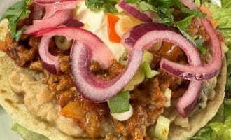 Beef Chilli Tostada with Refried Beans